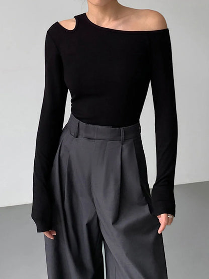 ALDO - TOP DE PUNTO AJUSTADO CON ABERTURAS