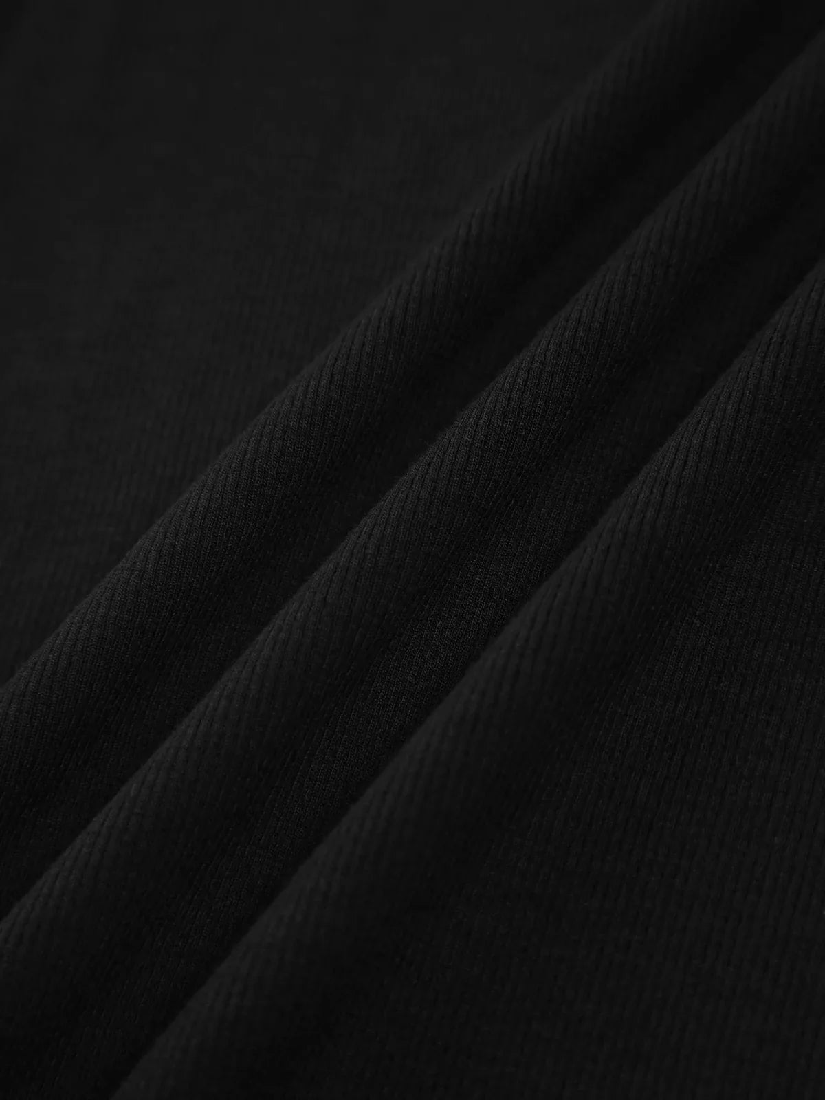 ALDO - TOP DE PUNTO AJUSTADO CON ABERTURAS