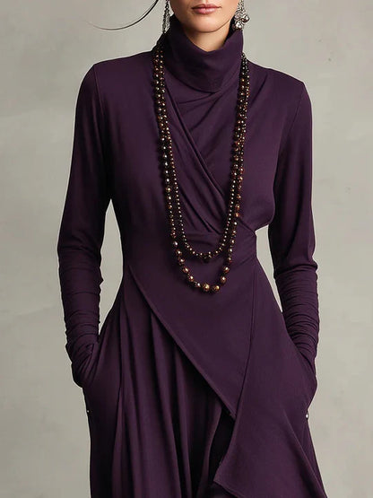 AURELIA | VESTIDO LARGO PLISADO ASIMÉTRICO CON CUELLO ALTO