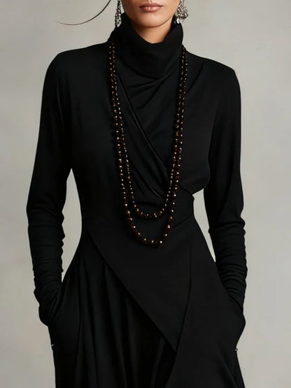 AURELIA | VESTIDO LARGO PLISADO ASIMÉTRICO CON CUELLO ALTO