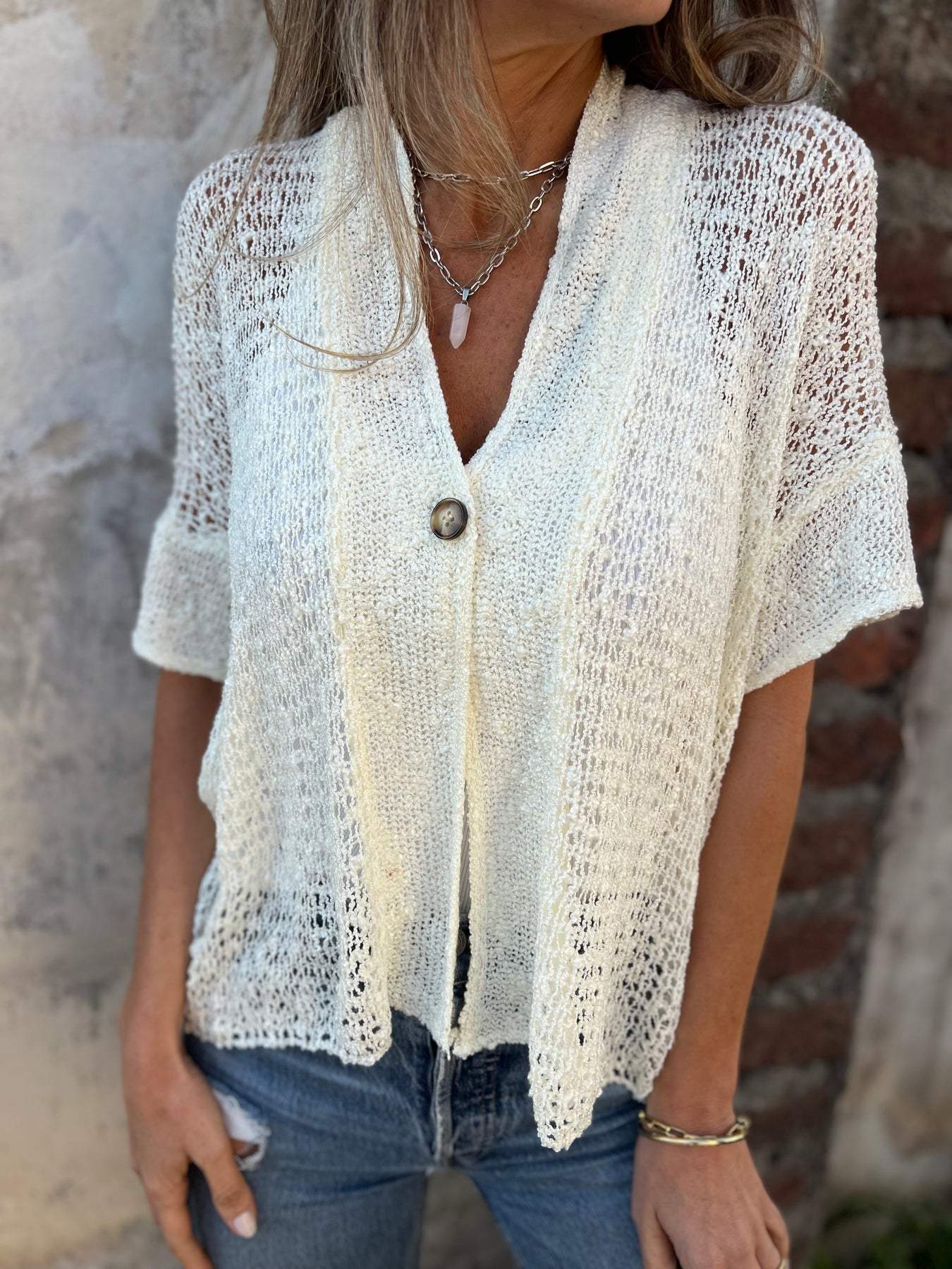 Top de crochet de manga corta