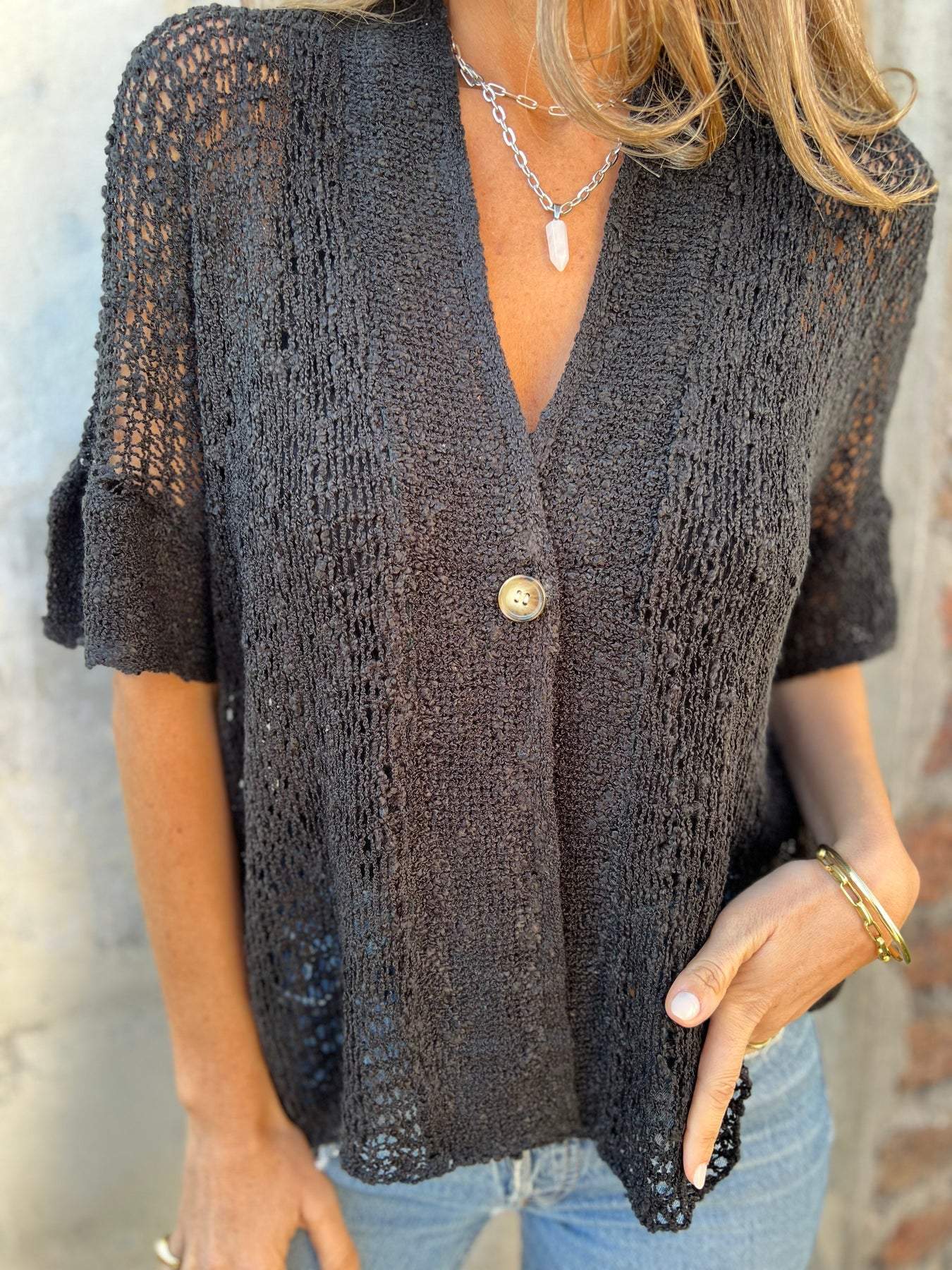 Top de crochet de manga corta
